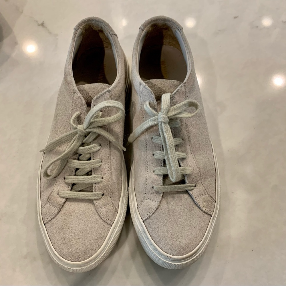 Women by Common Projects suede shoes.